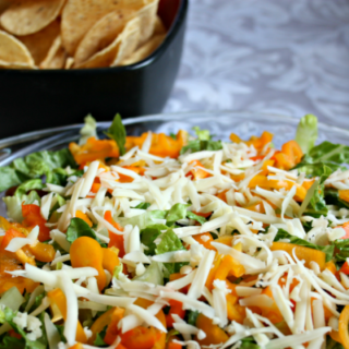 Cheesy, frugal, delicious Nacho Dip made with real food and only 50 cents per serving. Dairy-free, Vegetarian, and Vegan versions too! From CheapskateCook.com