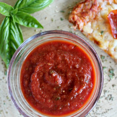 Clean & Cheap Pizza Sauce - This easy pizza sauce costs 40 cents for 2 large pizzas (frugal), takes less than 3 minutes to stir up (fast), and is made with real food ingredients you probably already have (WIN). From CheapskateCook.com