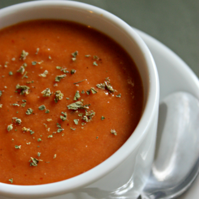 Simple, inexpensive tomato soup ready in 10 minutes and full of real food ingredients you can find at any store. Dairy-free version too! From CheapskateCook.com