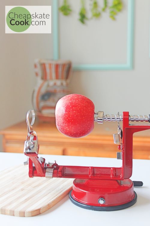 apple on the corer and slicer