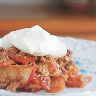 Simple, nourishing apple crisp that is healthy enough for breakfast! Made with fresh apples, whole grains, healthy fats, and just a touch of sweetener. No weird ingredients, with #glutenfree, #dairyfree, and #vegan variations! From CheapskateCook.com #fall #autumn #healthydessert #breakfast #dessert #realfood