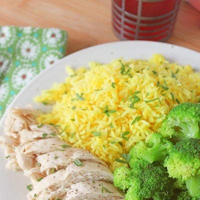 Easy Mediterranean Yellow Rice - Our favorite, simple recipe for yellow rice - with no artificial colors! Perfect with chicken, beef, fish, or vegetable curry. It is savory, flavorful, and the perfect bed for any Meditteranean or Eastern-inspired dish.