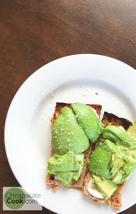 avocado toast on a white plate