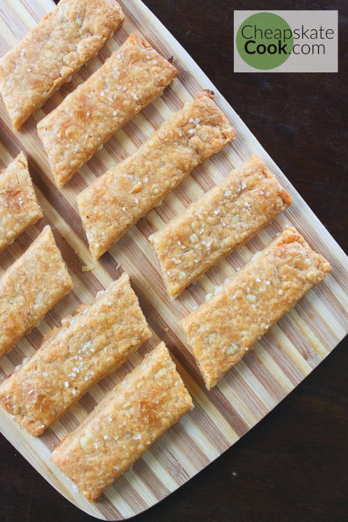 cheese crackers on cutting board