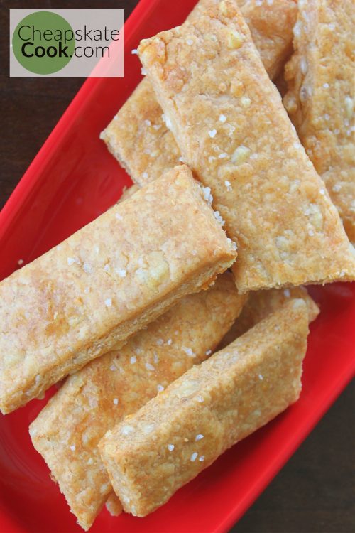 cheese crackers on red plate