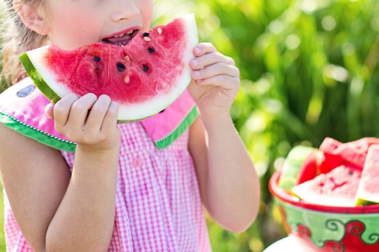 kid eating watermelon