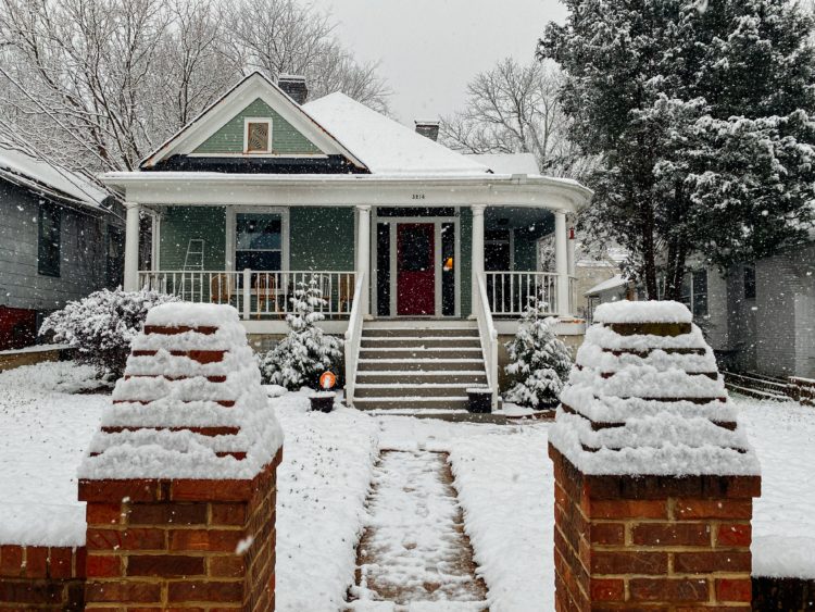 cold dreary house in snow