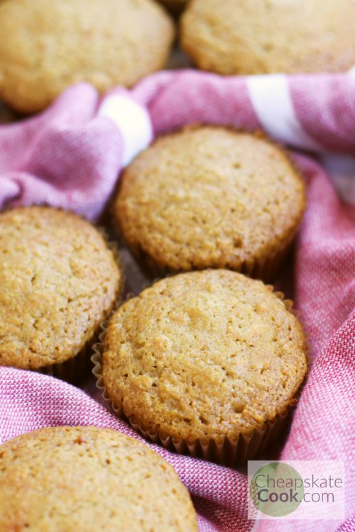 Whole wheat muffins recipe in a red towel