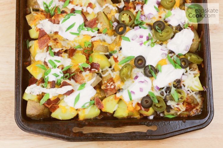 potato nachos with sour cream and green onions